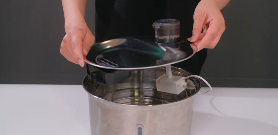 Rinse pet fountain parts with clean water